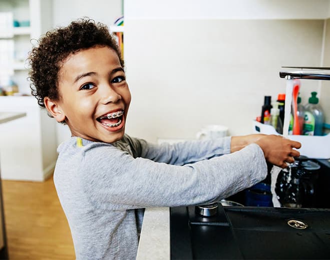 kid washing hands